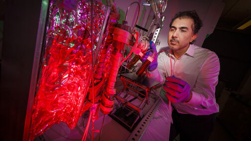 Ozan Ciftci, Kenneth E. Morrison Distinguished Professor of food engineering, operates an integrated supercritical carbon dioxide extractor-bioreactor, using green technology to extract lycopene.